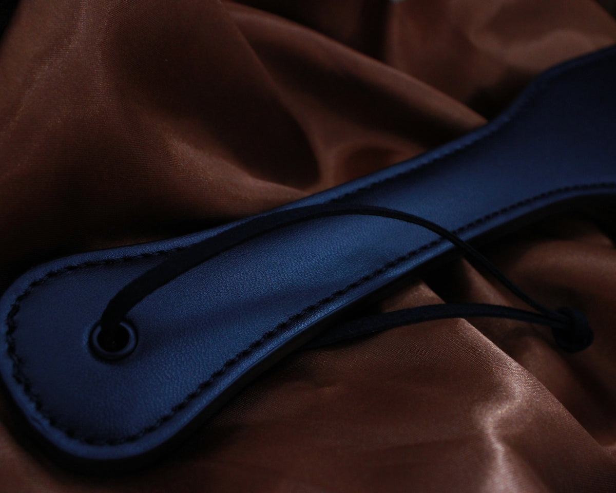 PADDLE EN CUIR