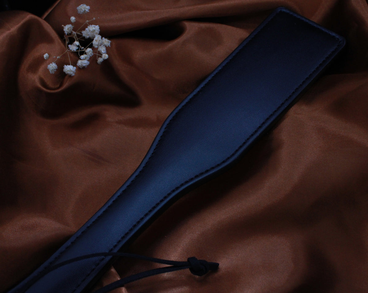 PADDLE EN CUIR